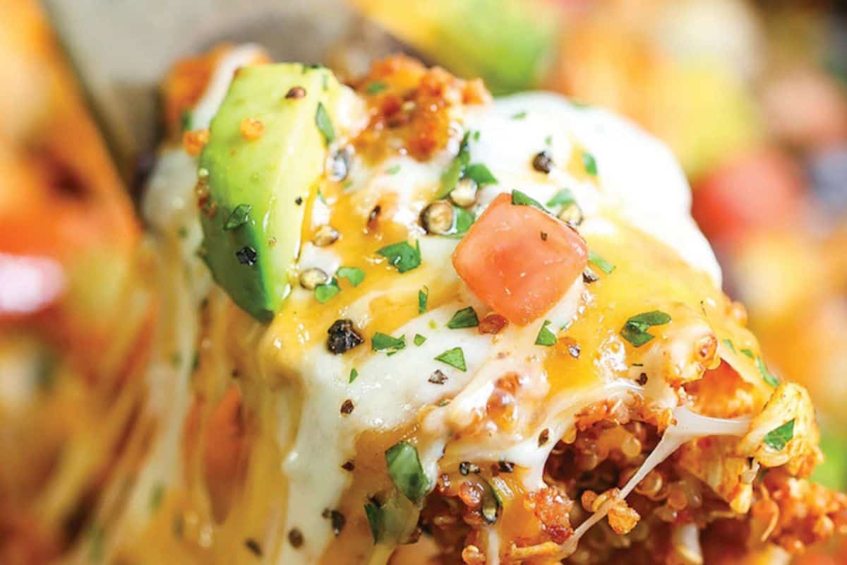 Forkful of slow cooker quinoa enchilada casserole. 