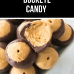 A bowl of buckeye candy with a creamy peanut butter center and chocolate coating. One piece is partially eaten, revealing the delicious inside. Text at the top reads "Easy & Creamy Buckeye Candy.