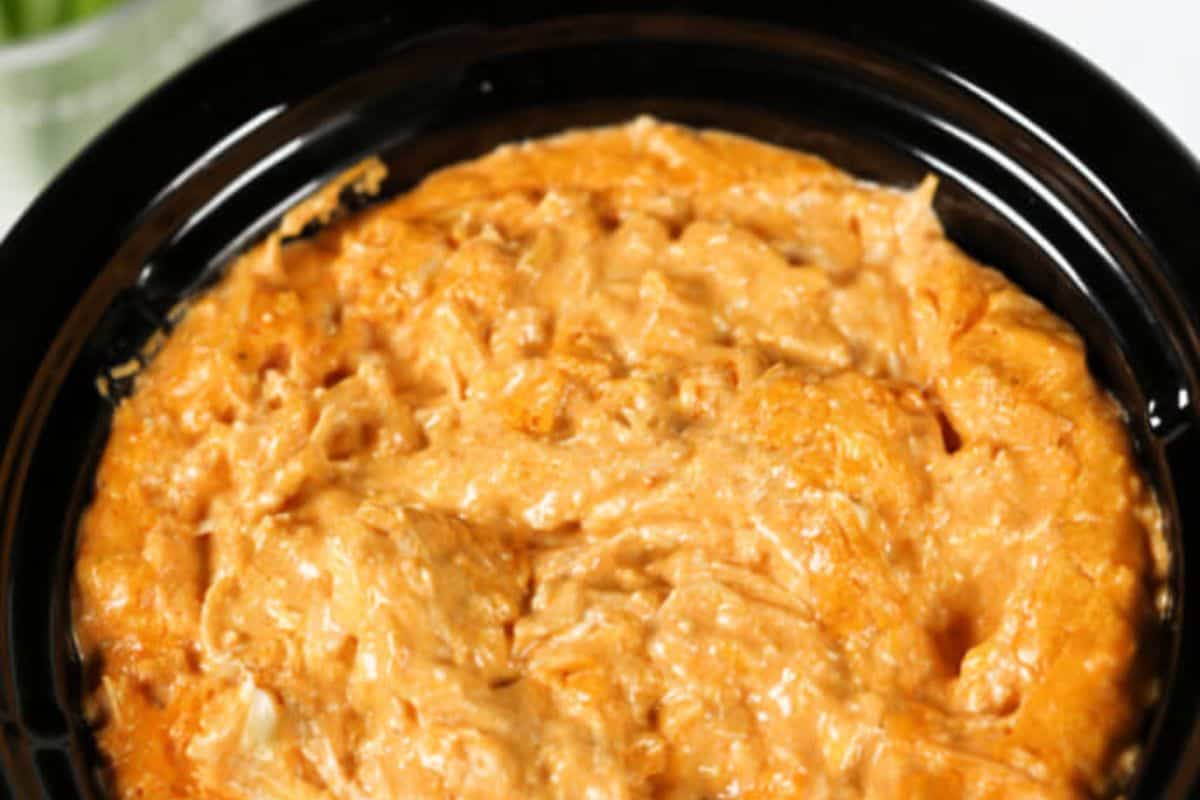 A crock pot full of buffalo chicken dip. 