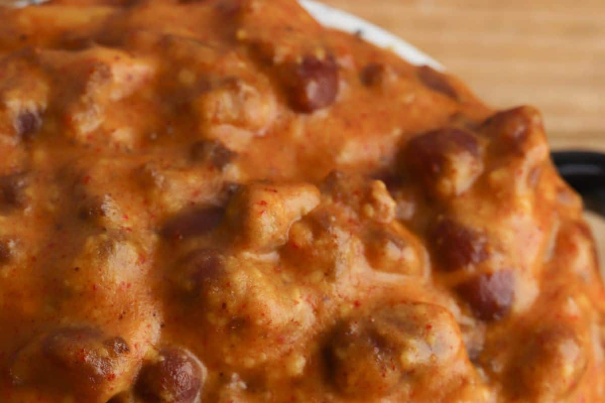 A close up of chili cheese dip. 