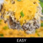 A cheesy hamburger and hash brown casserole sprinkled with fresh green onions, featuring the text: "Easy Hamburger and Hash Brown Casserole.