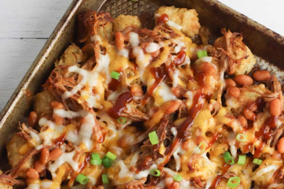 A baking tray filled with BBQ Totchos.