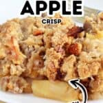 Close-up of delicious Crock Pot Apple Crisp served on a white plate, with text overlay reading “Crock Pot Apple Crisp Easy.”.