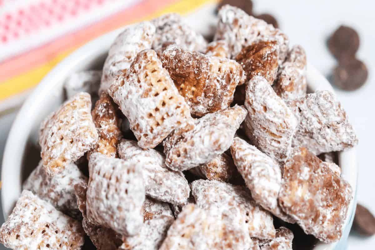 A bowl of chex mix muddy buddies.