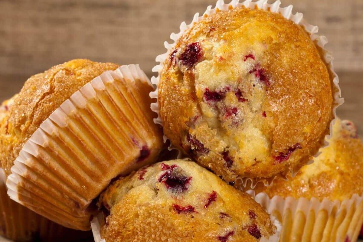 A stack of cranberry walnut muffins.