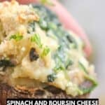 Close-up of a hand holding a Spinach and Boursin Cheese stuffed mushroom, topped with melted cheese; text overlay promotes sharing this delicious Stuffed Mushrooms recipe via direct message.