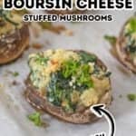 A baked mushroom cap stuffed with savory spinach and creamy Boursin cheese, garnished with herbs, sits on parchment paper; more delicious stuffed mushrooms are visible in the background.