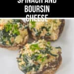 Close-up of three Boursin cheese stuffed mushrooms topped with spinach and herbs on a white plate. Text overlay: "Spinach and Boursin Cheese.