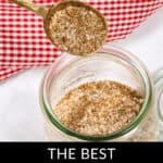 A spoonful of steak rub hovers above an open jar, accentuated by a red and white checkered cloth in the background. Text below proudly declares it as "The Best Steak Rub.