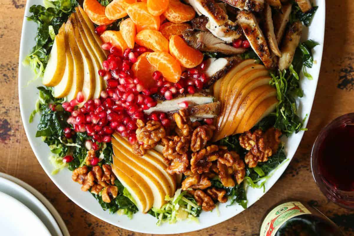 Winter pear salad on a white serving dish.