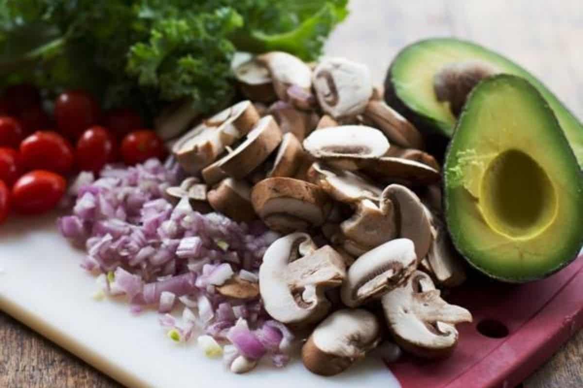 This is a close up of the vegtables that go into a Avocado Veggie Panini.