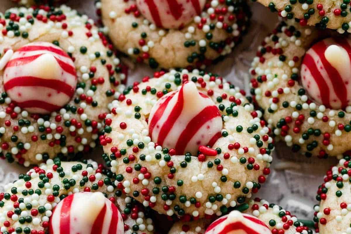 Peppermint-flavored cookies with Hershey’s Candy Cane Kisses in the center, decorated with sprinkles.
