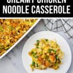 A serving of Creamy Chicken Noodle Casserole with peas and a crumb topping sits on a white plate beside the casserole dish on a marble countertop.