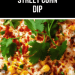 A close-up of our irresistible Mexican Street Corn Dip, beautifully topped with fresh cilantro, tangy cheese, and a sprinkle of chili powder.
