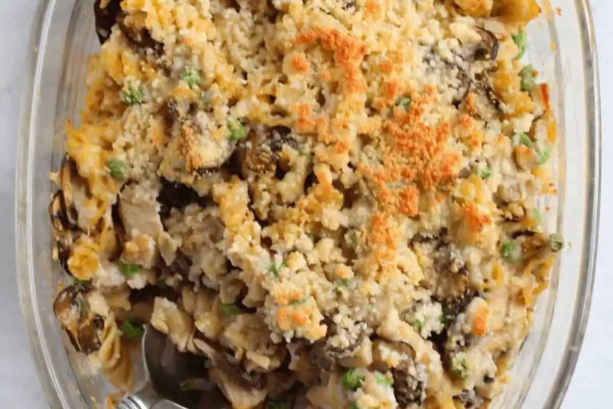 A good casserole for cooler weather, this baked dish is filled with pasta, chicken, mushrooms, and peas, then topped with a golden breadcrumb and cheese crust.