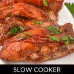 A close-up reveals saucy, garnished slow-cooker country style ribs resting elegantly on a white plate.