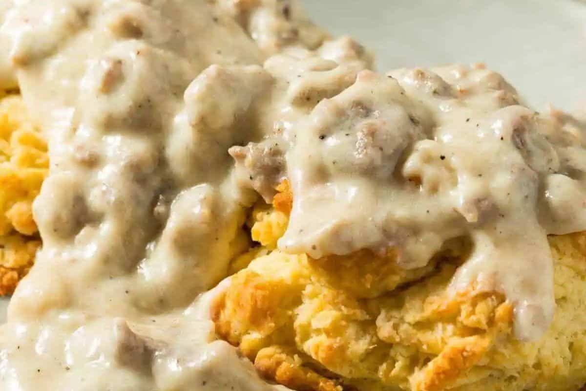 Some cheesy biscuits topped with a hearty white sausage gravy.