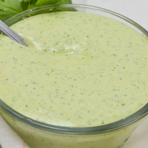 A clear dish of the cilantro lime sauce.
