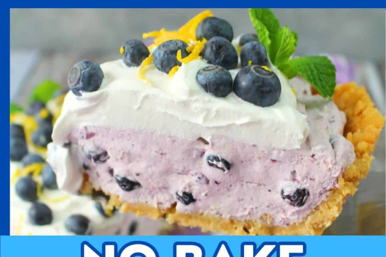 A slice of no-bake blueberry pie is a beautiful dessert, topped with whipped cream, fresh blueberries, lemon zest, and a mint sprig.