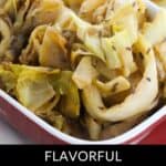 A close-up of braised cabbage with visible caraway seeds in a red dish, accompanied by the text "Flavorful Braised Cabbage"—a delicious and aromatic side for any meal.