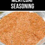 A close-up showcases a glass bowl brimming with a rich meatloaf seasoning mix, its warm reddish-brown hue contrasting against the striped surface.