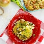 The casserole on a checkered placemat.
