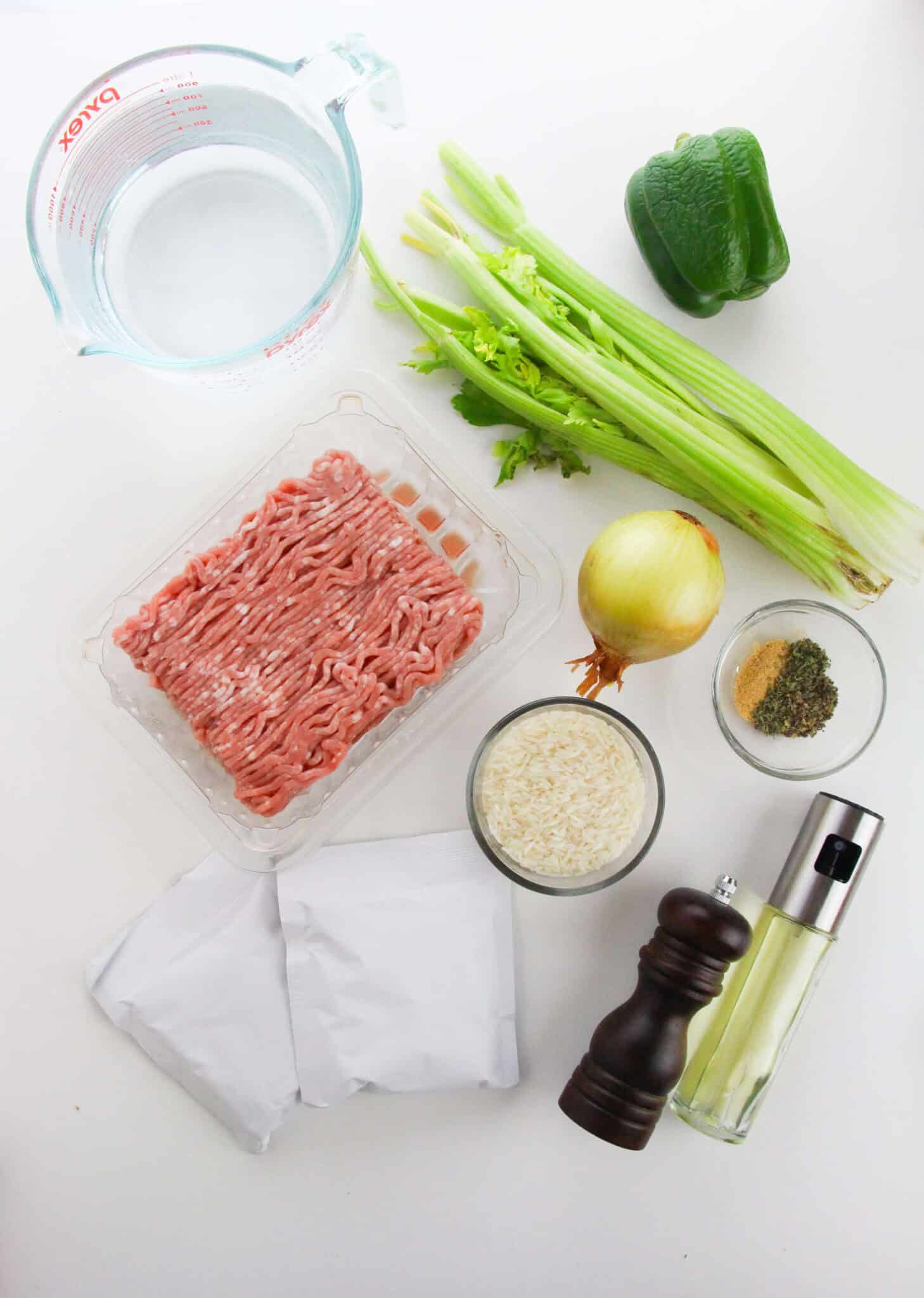 Ground sausage, vegetables and rice for the casserole.