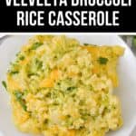 A serving of velveeta broccoli rice casserole, with creamy melted cheese and tender broccoli, sits invitingly on a white plate.