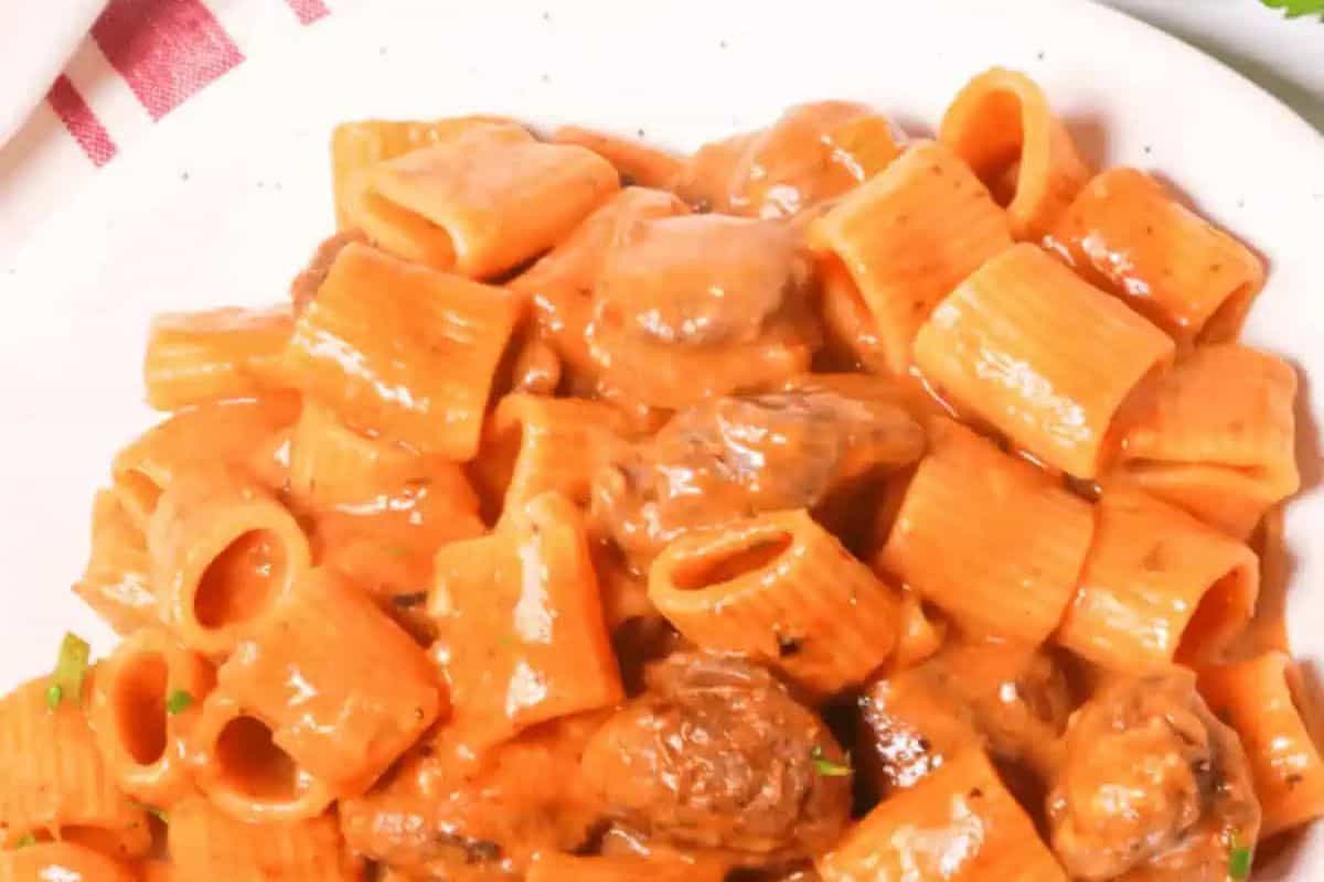 Thick, ridged pasta is coated in a creamy tomato sauce and tossed with chunks of flavorful Italian sausage. The bold flavors and rich texture make this a comforting, crave-worthy dish ideal for any pasta night.
