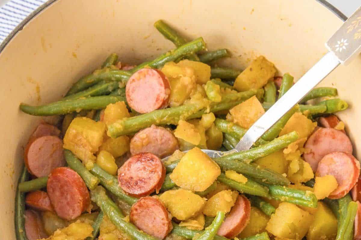 This rustic one-pot meal combines tender potatoes, crisp green beans, and smoky sausage slices. It’s a comforting and filling dish that’s easy to prepare and great for feeding a hungry family.