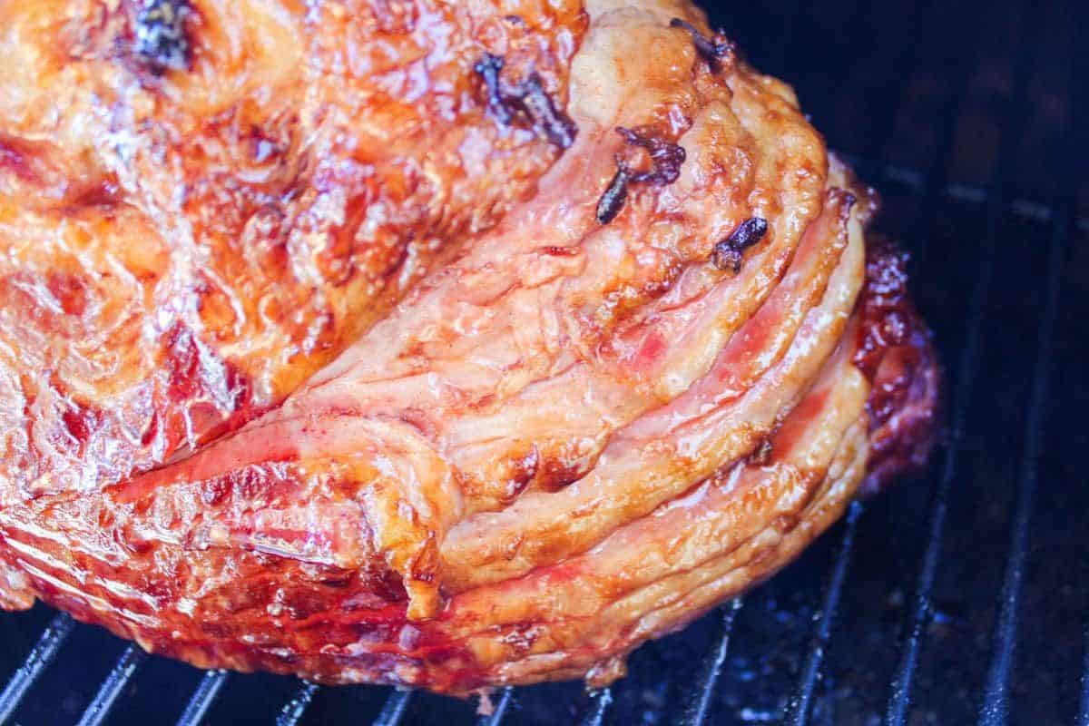 This Spiral Smoked Ham boasts a beautifully golden exterior with a glossy, smoky finish that hints at hours of slow cooking. The spiral-cut layers reveal tender, juicy meat infused with rich flavor. Perfectly caramelized and kissed by the grill, it’s a mouthwatering centerpiece that tastes as amazing as it looks.