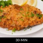 Two crispy pork cutlet fillets garnished with parsley, served on a white plate with lemon wedges and greens. Text reads: "30-MIN CRISPY BREADED PORK CUTLETS.