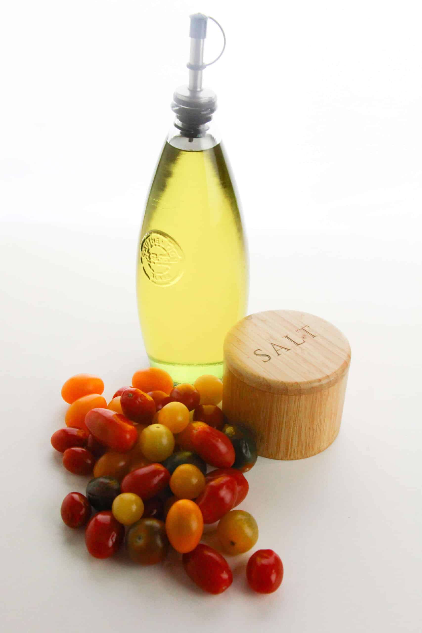 Cherry tomatoes, olive oil and seasoning for the dish.