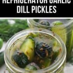 An open jar filled with sliced cucumbers, dill, garlic, and spices, labeled as zesty Garlic Dill Pickles—perfect for refrigerator storage.