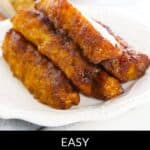 Four slices of roasted pineapple stacked on a white plate with a blurred background; text at the bottom reads "Easy Roasted Pineapple," highlighting this simple and delicious way to enjoy roasted pineapple as a dessert or snack.