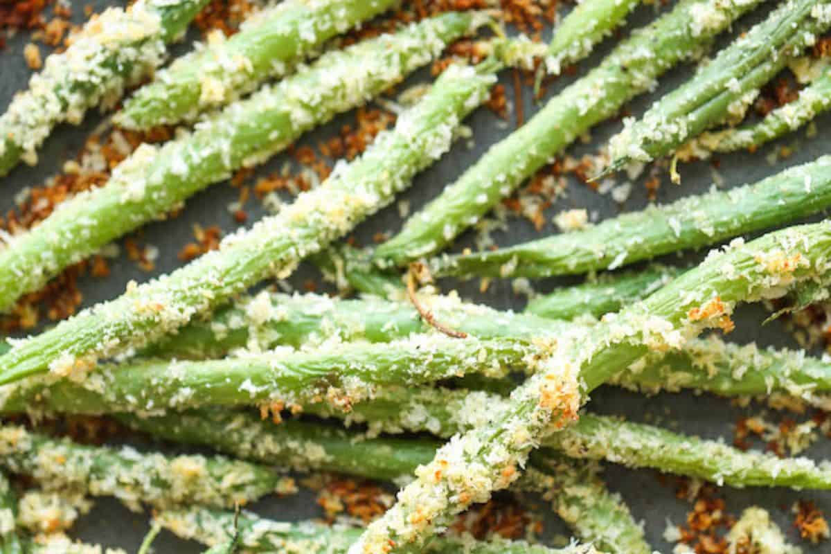 These crispy Baked Green Bean Fries are coated in a golden layer of seasoned breadcrumbs and baked to perfection. Each fry delivers a satisfying crunch while keeping the green beans tender inside. A healthier alternative to traditional fries that’s great for snacking or side-dishing.