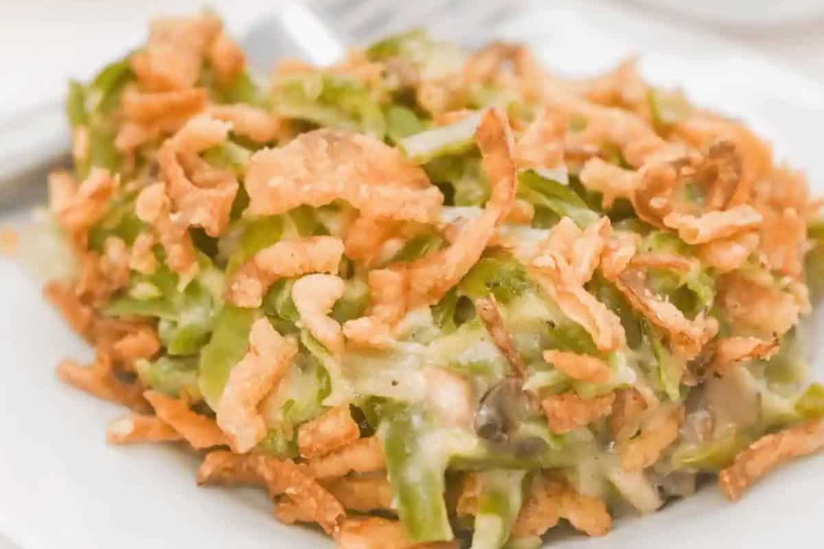 This reinvented green bean casserole skips the canned soup in favor of a fresh, creamy base. The dish is topped with golden crispy onions, giving it all the comforting texture and flavor you’d expect—without any shortcuts. A modern twist on a classic favorite.