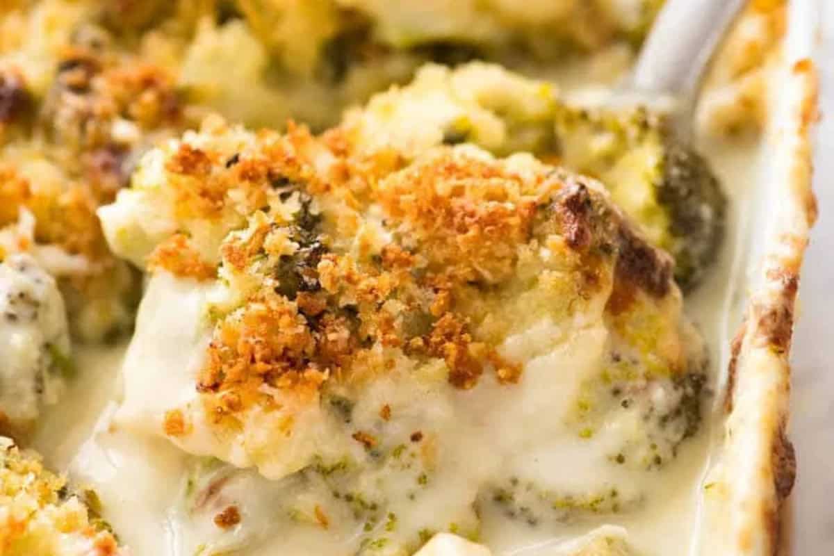 Close-up of a delicious broccoli casserole topped with golden breadcrumbs and creamy cheese sauce in a baking dish—perfect for picky eaters and fans of Broccoli recipes.