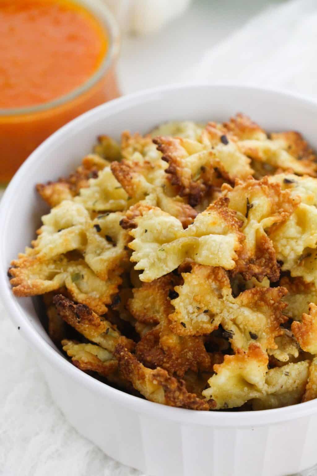 A dish of the air fryer pasta chips.