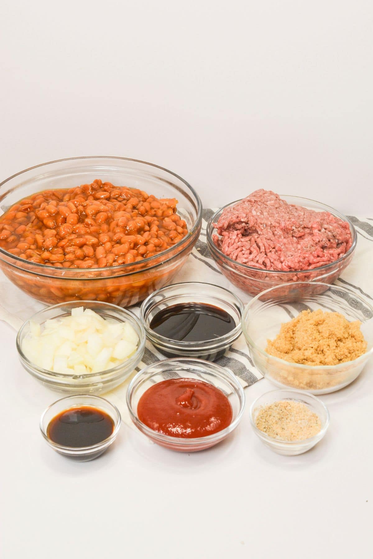 The beans, ground meat, and seasonings to make this dish.