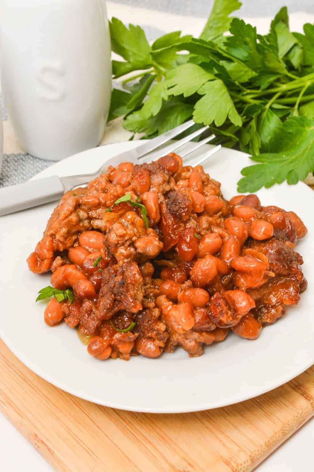 A white plate with the finished side dish o it.