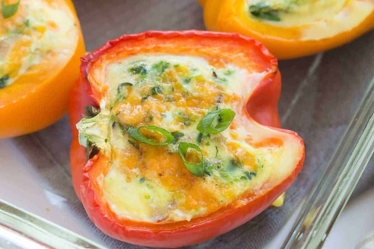 Close-up of a breakfast stuffed red bell pepper.