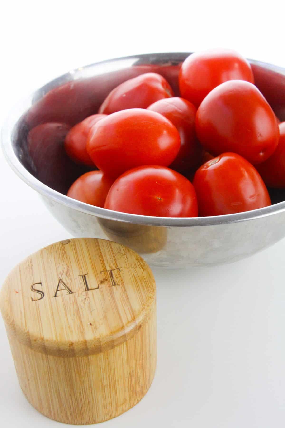 Ripe vegetables with a side of sea salt.