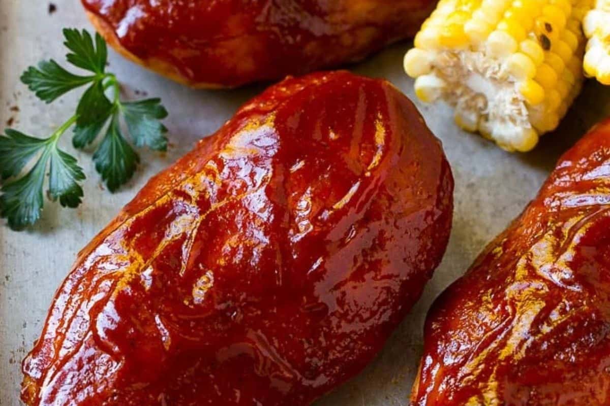 Smoked chicken breast with a rich, dark, smoky crust and juicy interior.