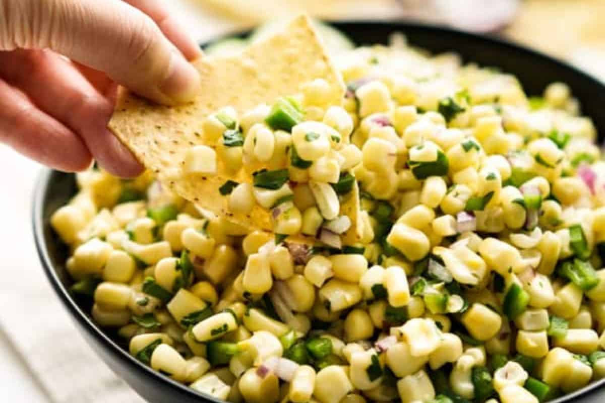 Chipotle corn jalapeño salsa with roasted corn, red onion, and cilantro in a creamy, tangy dressing.