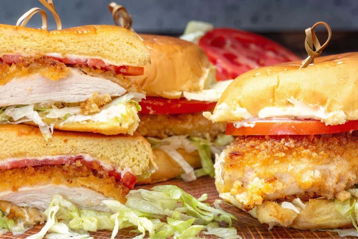 A spicy chicken sandwich coated in flavorful seasoning, nestled inside a toasted bun.