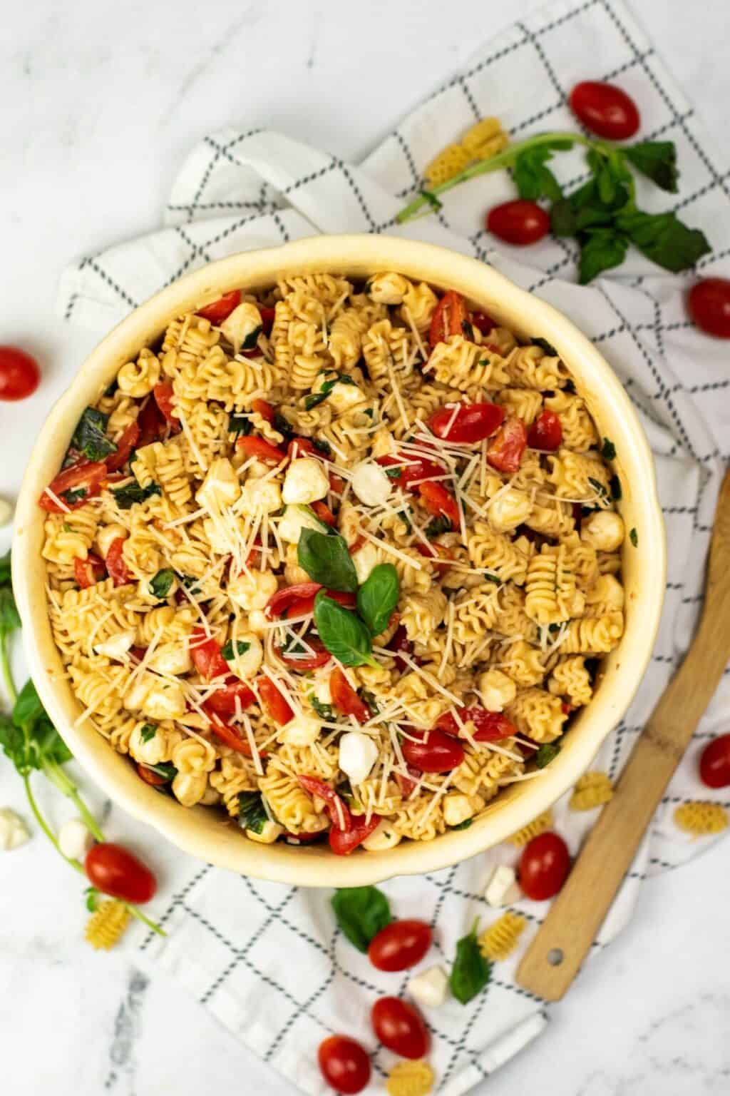 A top shot of the caprese balsamic pasta salad.