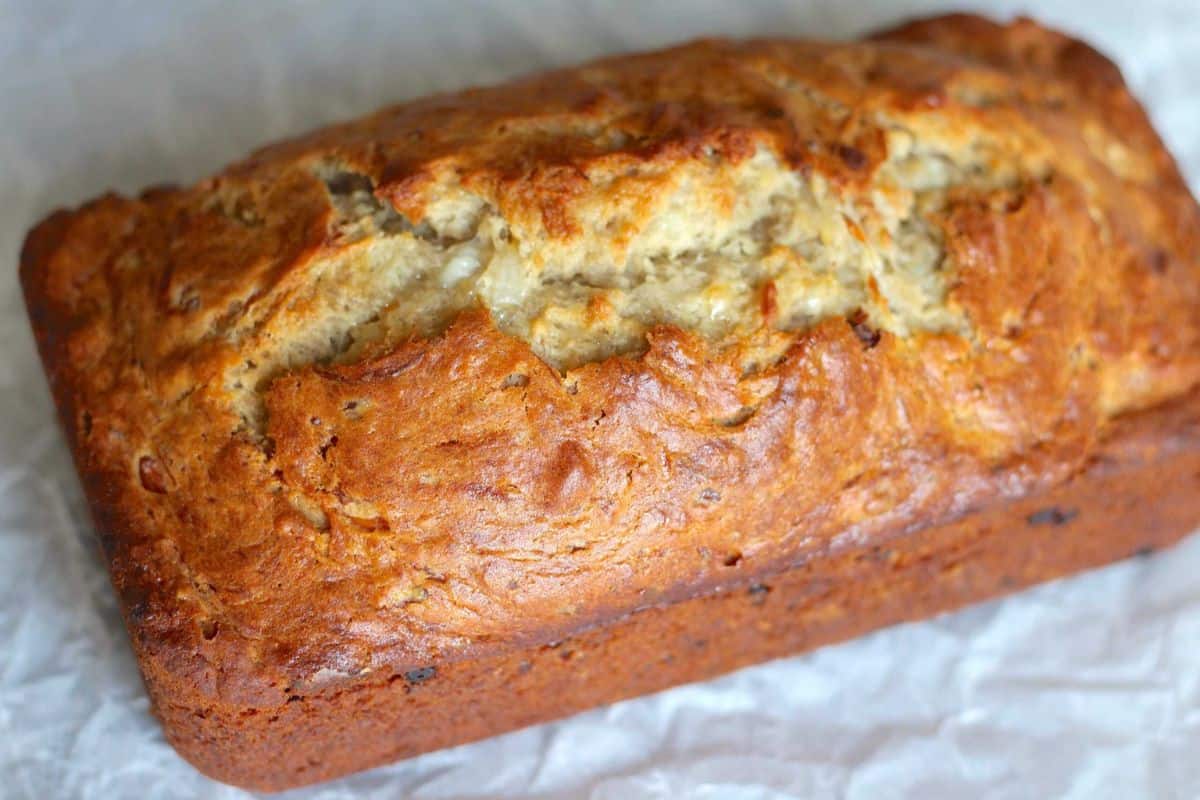 Close-up of a load of cottage cheese banana bread, ready to be sliced.