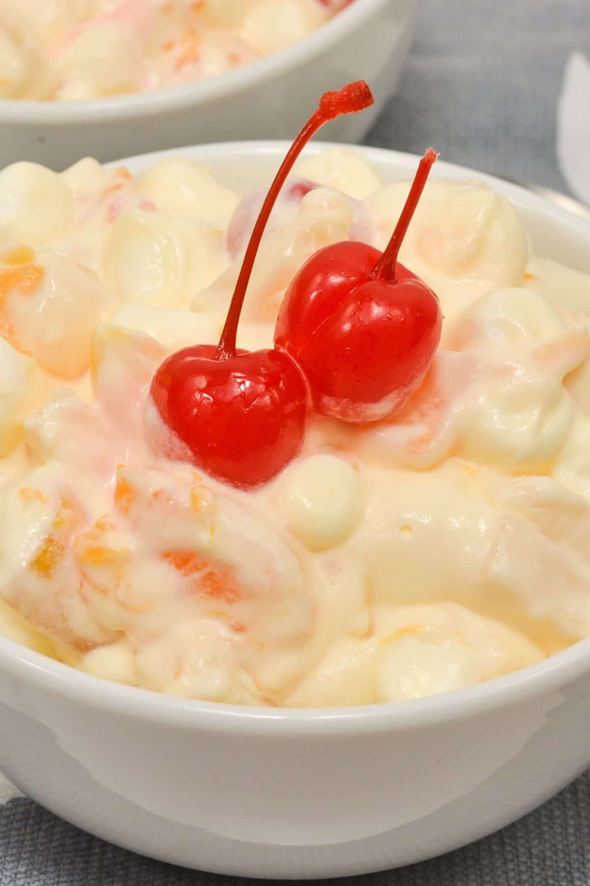 Cherries on top of the ambrosia salad.