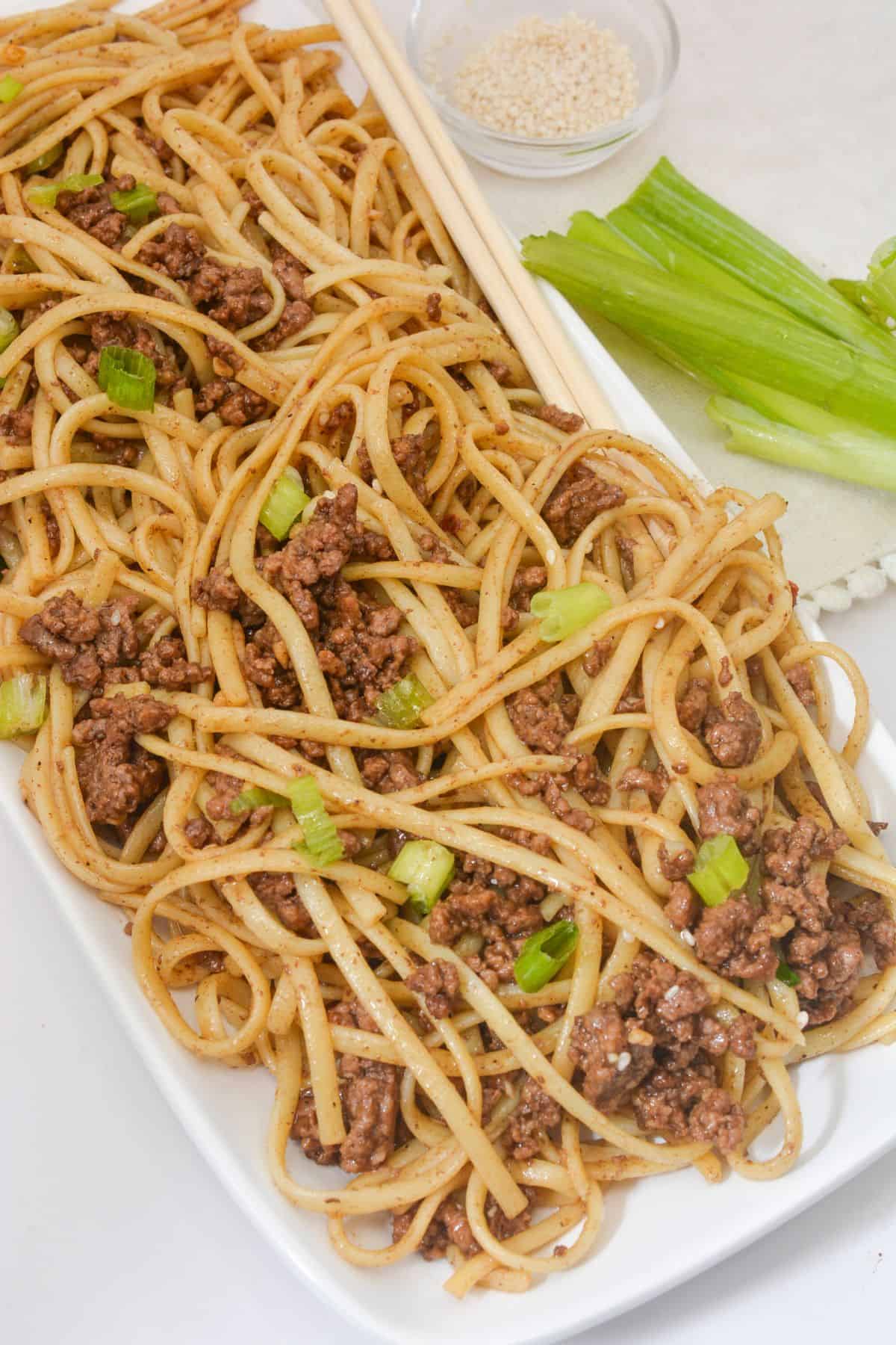 A of  platter of mongolian ground beef noodles.